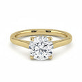My Store 4 round cut solitaire engagement ring in yellow gold with a hidden halo and cathedral setting