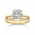 My Store 4 round solitaire engagement ring with a micro-pavé eternity wedding band in polished 18K yellow gold.