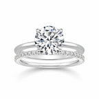 My Store 4 round solitaire engagement ring with a micro-pavé eternity wedding band in polished white gold.