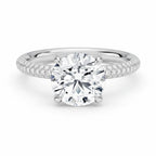 My Store 4 round cut solitaire engagement ring in white gold with a triple-row micro-pavé diamond band