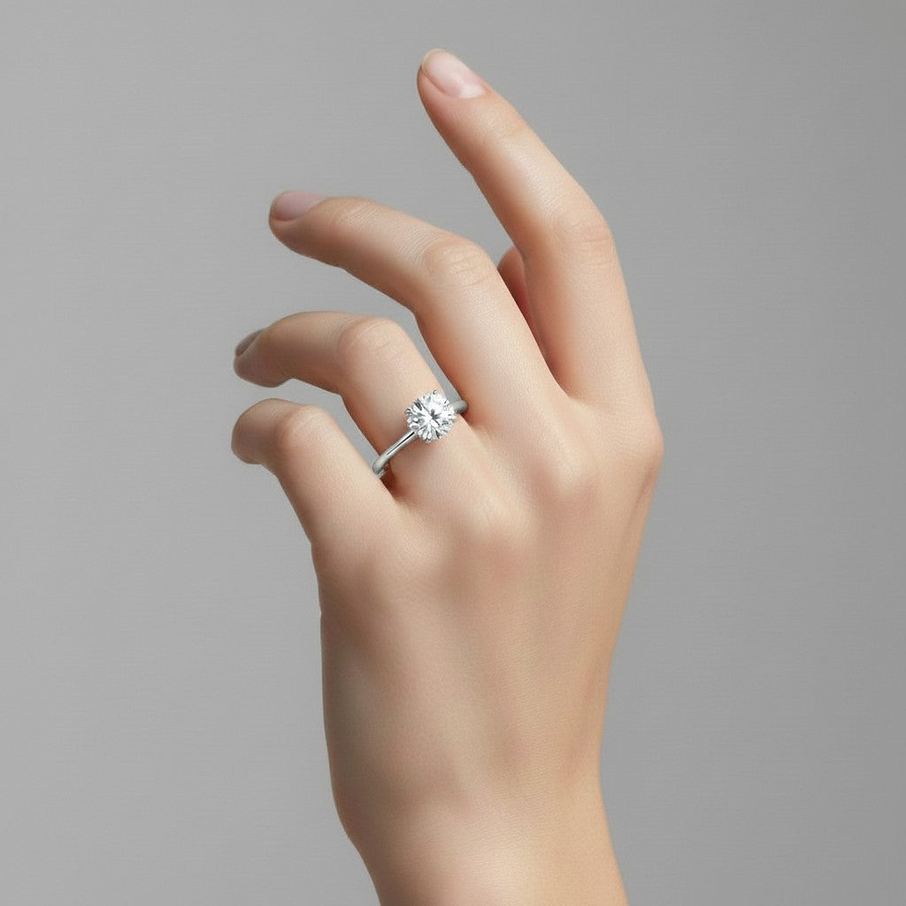 My Store 4 classic round cut solitaire engagement ring with a brilliant diamond on a polished white gold band