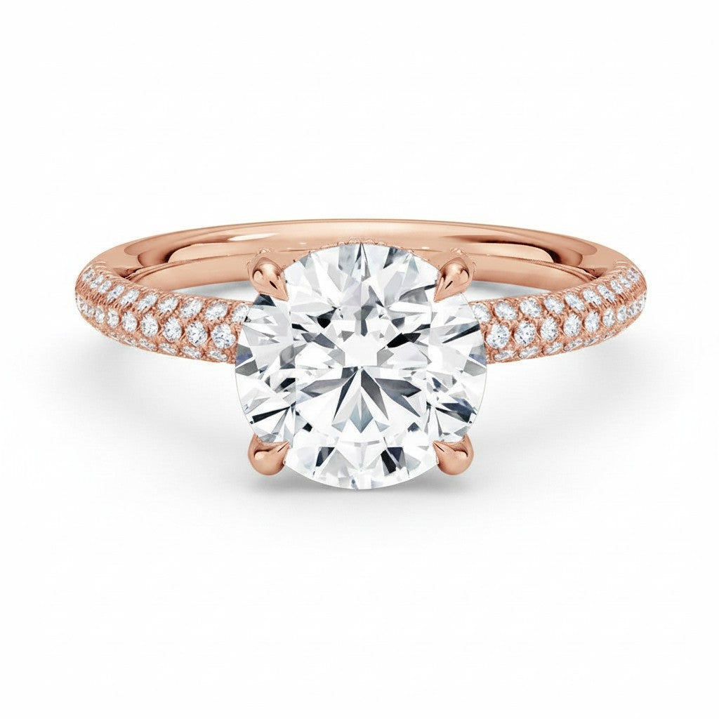 My Store 4 round cut solitaire engagement ring in rose gold with a triple-row micro-pavé diamond band.