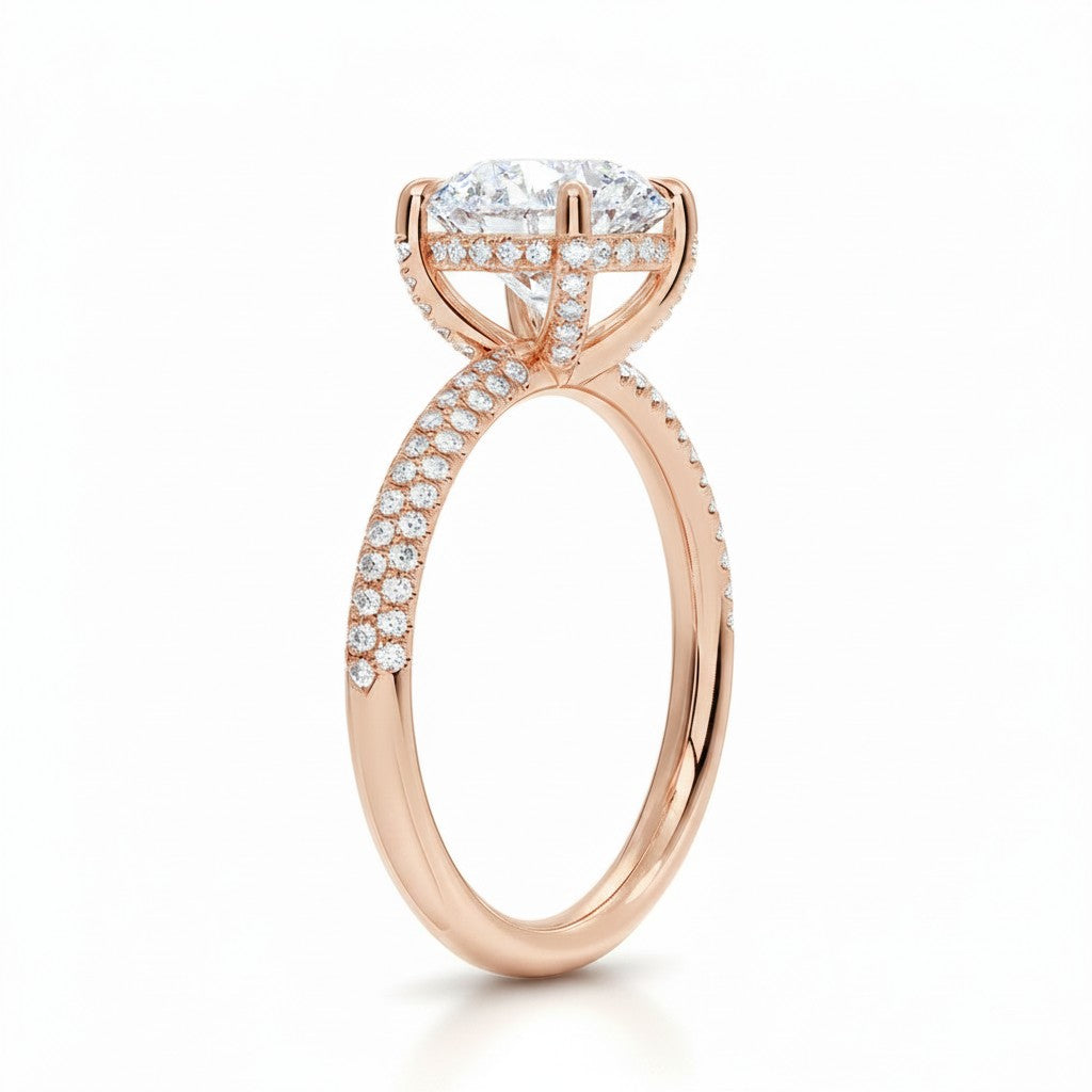 My Store 4 round cut solitaire engagement ring in rose gold with a triple-row micro-pavé diamond band