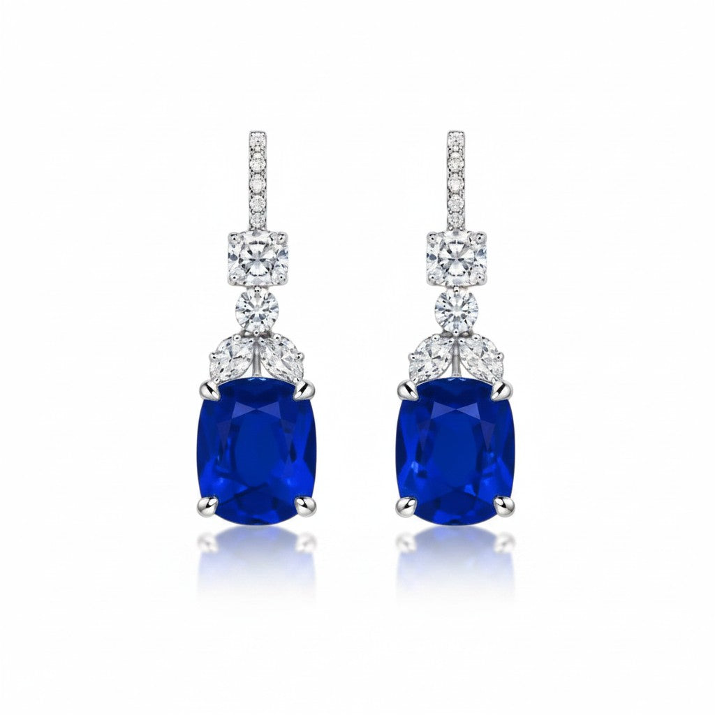 My Store 4 18K white gold drop earrings featuring cushion-cut blue sapphires and brilliant lab-grown diamonds.