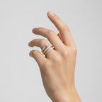 My Store 4 spiral coil multi-band engagement ring in yellow gold with a round solitaire diamond and pavé accents.