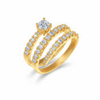 My Store 4 spiral coil multi-band engagement ring in yellow gold with a round solitaire diamond and pavé accents.