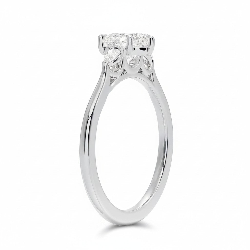 My Store 4 18K solid gold three stone lab diamond engagement ring with a polished band, side profile view.