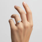 My Store 4 18K solid gold three stone engagement ring featuring a heart-shaped lab-grown diamond on a woman's finger.
