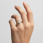 My Store 4 18K solid gold three stone lab-grown diamond engagement ring worn on a woman's finger