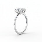 My Store 4 18K solid gold Toi et Moi ring featuring a pear and heart cut lab-grown diamond side profile view