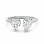 My Store 4 18K solid gold Toi et Moi ring featuring a pear-cut and heart-cut lab-grown diamond in a bypass setting.
