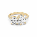 My Store 4 Toi et Moi engagement ring with round and oval diamonds on a pavé solid yellow gold band.