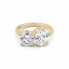 My Store 4 Toi et Moi engagement ring with round and oval diamonds on a pavé solid yellow gold band.