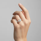 My Store 4 Toi et Moi engagement ring with dual pear-cut diamonds on a micro-pavé solid gold band worn on a finger