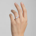 My Store 4 Toi et Moi engagement ring with dual pear-cut stones and micro-pavé band on a woman's finger