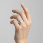 My Store 4 18K solid gold trilogy engagement ring featuring a princess-cut lab diamond and trilliant side stones.