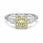My Store 4 18K solid gold trilogy ring featuring a central round lab-grown diamond flanked by two pear-cut diamonds.