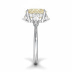 My Store 4 18K solid gold trilogy engagement ring with a pear-cut lab-grown diamond and side stones, side view.