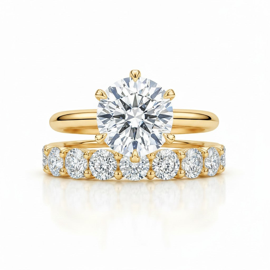 My Store 4 round tulip solitaire engagement ring and eternity band set in 18K yellow gold with brilliant diamonds.