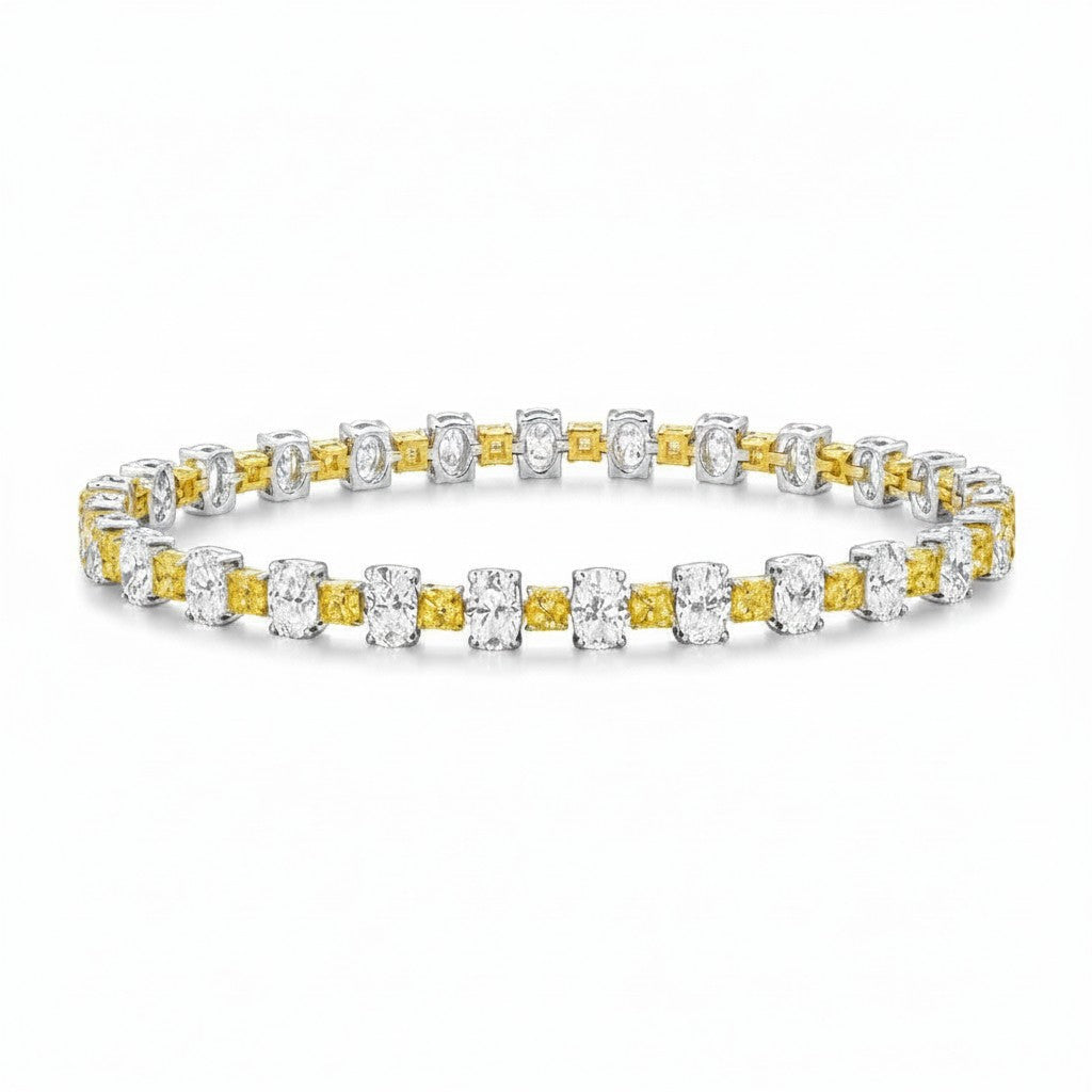 My Store 4 two-tone tennis bracelet featuring alternating fancy yellow cushion-cut and white oval-cut diamonds in gold.