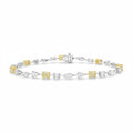 My Store 4 two-tone gold tennis bracelet featuring fancy yellow oval diamonds alternating with multi-shape white diamonds.