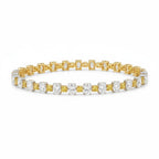 My Store 4 two-tone tennis bracelet with alternating fancy yellow cushion and white oval diamonds in gold settings.