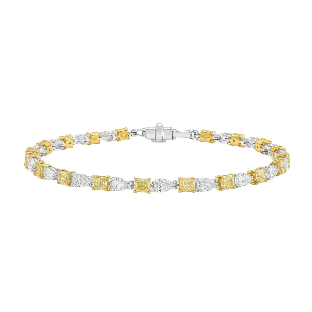 My Store 4 two-tone tennis bracelet with fancy yellow cushion-cut and white pear-cut diamonds in gold settings.