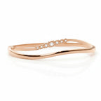 My Store 4 wave-contoured rose gold bangle bracelet featuring a graduated row of round brilliant diamonds.