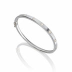My Store 4 white gold bangle bracelet featuring flush-set round diamonds in a sleek, snag-free design.