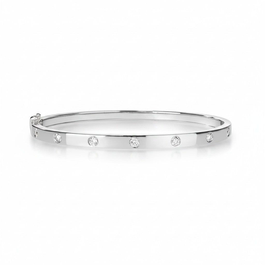 My Store 4 white gold bangle bracelet featuring round flush-set diamonds in a sleek, snag-free design.