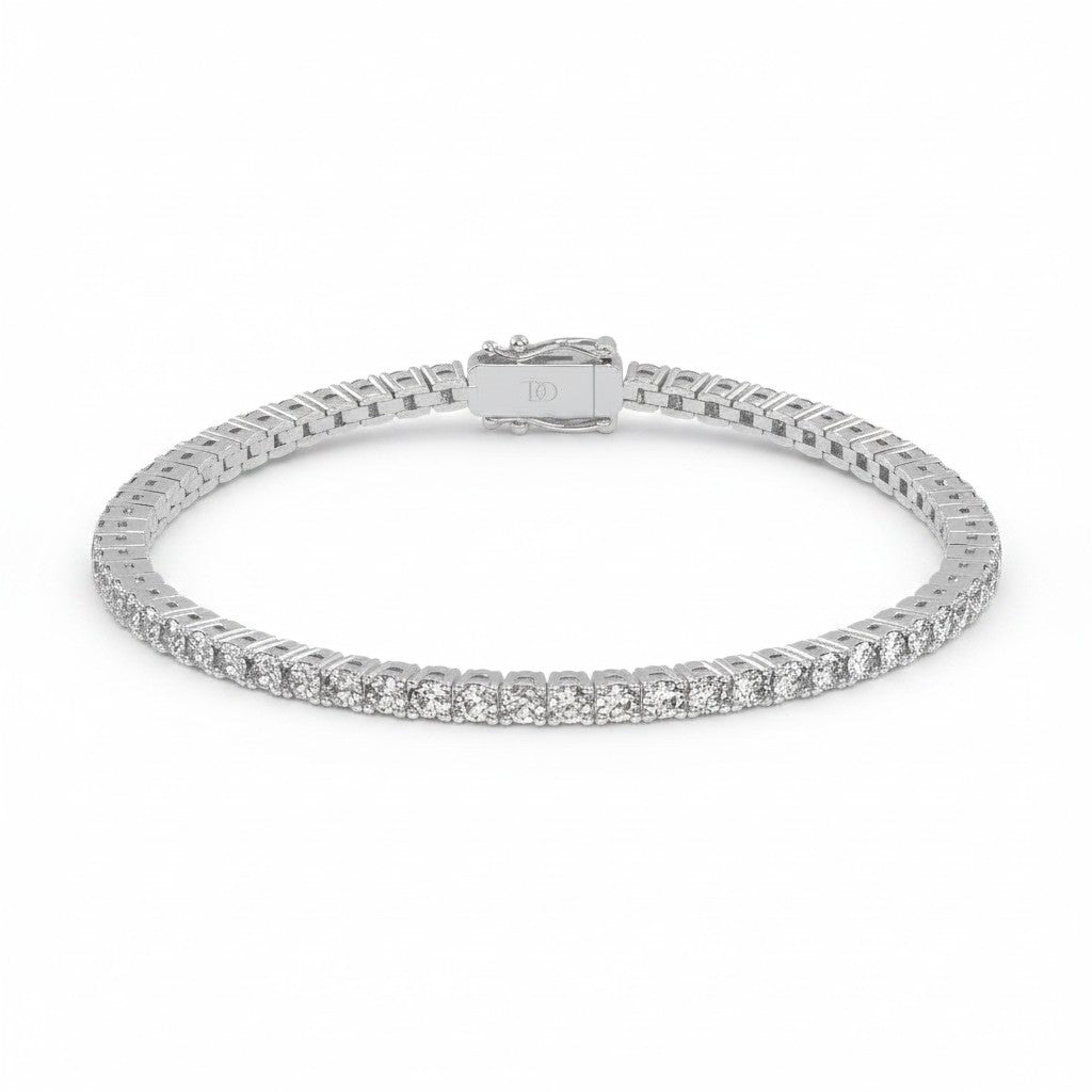 My Store 4 round brilliant diamond tennis bracelet in white gold with a secure box clasp and four-prong settings.