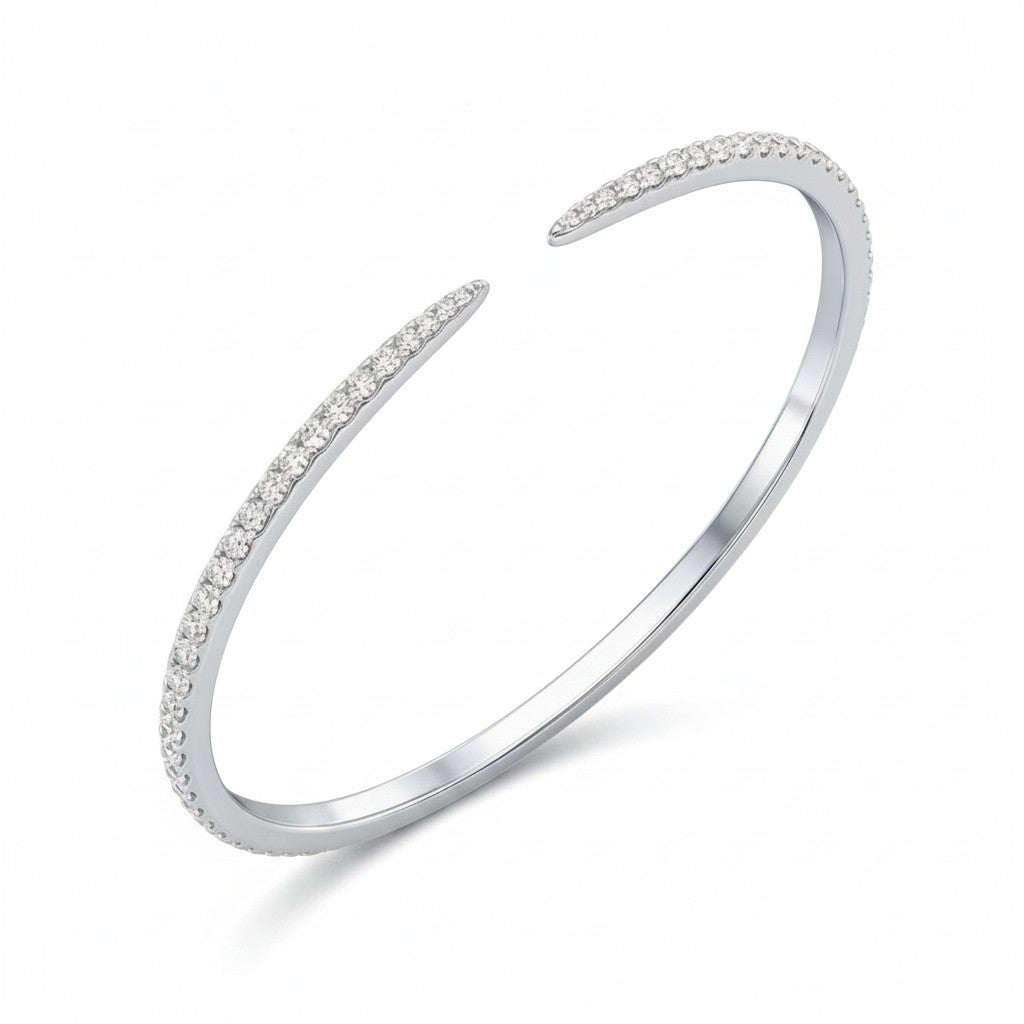 My Store 4 open pavé diamond bangle bracelet in white gold with a sleek tapered cuff design and micro-pavé setting.
