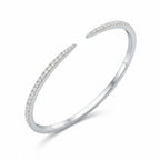 My Store 4 open pavé diamond bangle bracelet in white gold with a sleek tapered cuff design and micro-pavé setting.