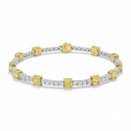 My Store 4 two-tone tennis bracelet featuring fancy yellow cushion-cut diamonds and white princess-cut diamond links.