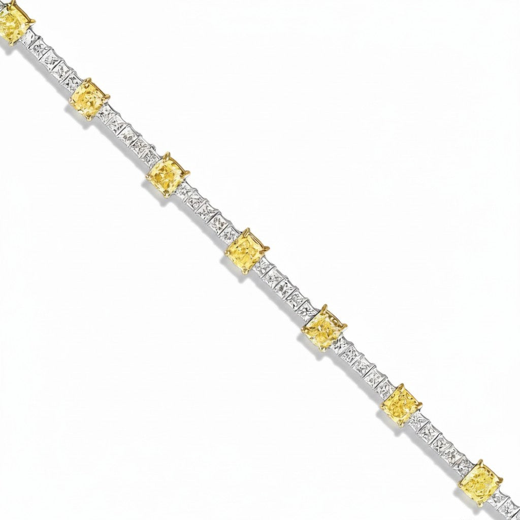 My Store 4 two-tone tennis bracelet featuring fancy yellow cushion-cut diamonds and white princess-cut diamonds.
