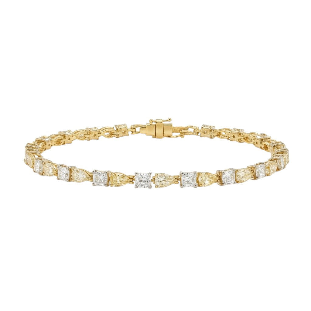 My Store 4 two-tone tennis bracelet featuring alternating fancy yellow cushion-cut and white pear-cut diamonds in gold.