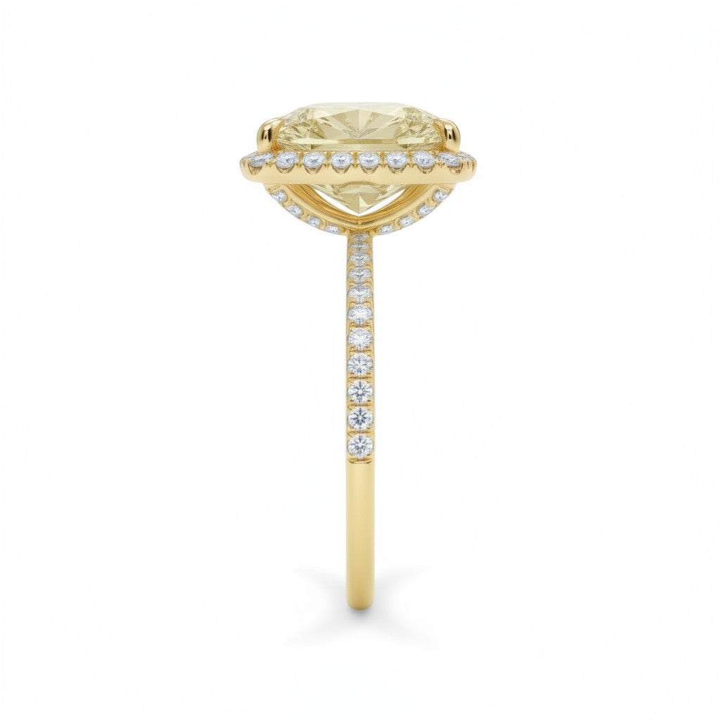 My Store 4 18K solid gold radiant-cut fancy yellow diamond halo ring with diamond-encrusted band, side view.