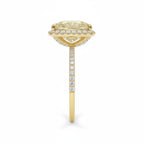 My Store 4 18K solid gold radiant-cut fancy yellow diamond halo ring with diamond-encrusted band, side view.