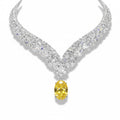 My Store 4 high jewellery necklace featuring a large fancy yellow oval diamond drop with white diamond V-shaped collar.