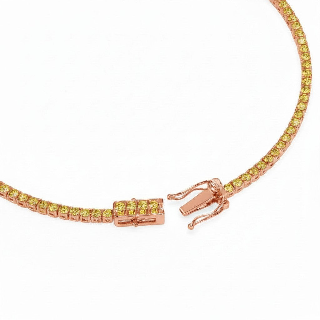 My Store 4 tennis bracelet featuring a continuous row of fancy yellow round-cut diamonds in a secure gold basket setting.
