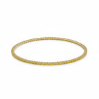 My Store 4 classic tennis bracelet featuring a continuous row of round-cut fancy yellow diamonds in gold settings.