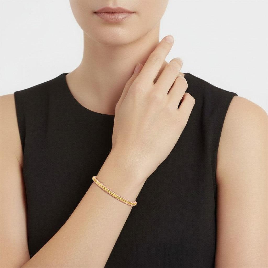 My Store 4 yellow gold tennis bracelet featuring a continuous row of brilliant fancy yellow round-cut diamonds.