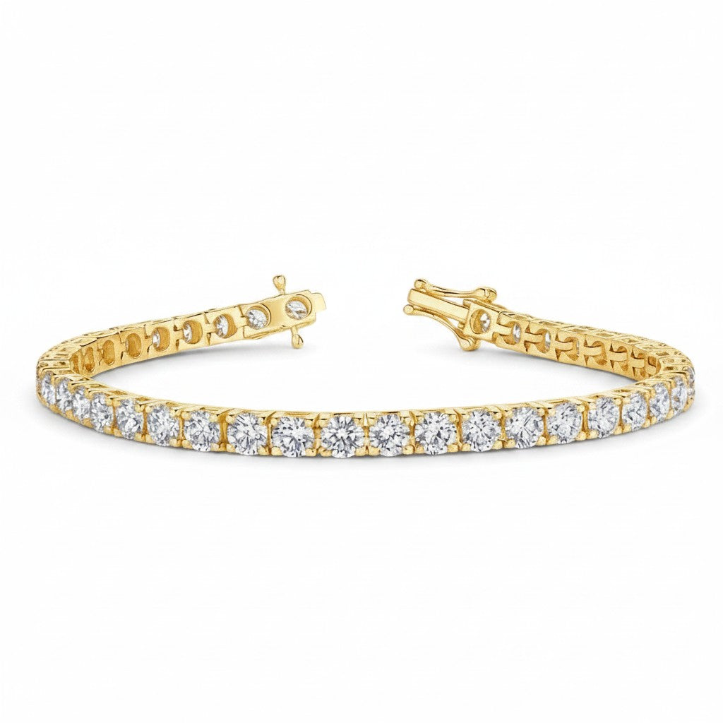 My Store 4 custom 4-prong yellow gold tennis bracelet featuring round brilliant cut diamonds with a secure box clasp.