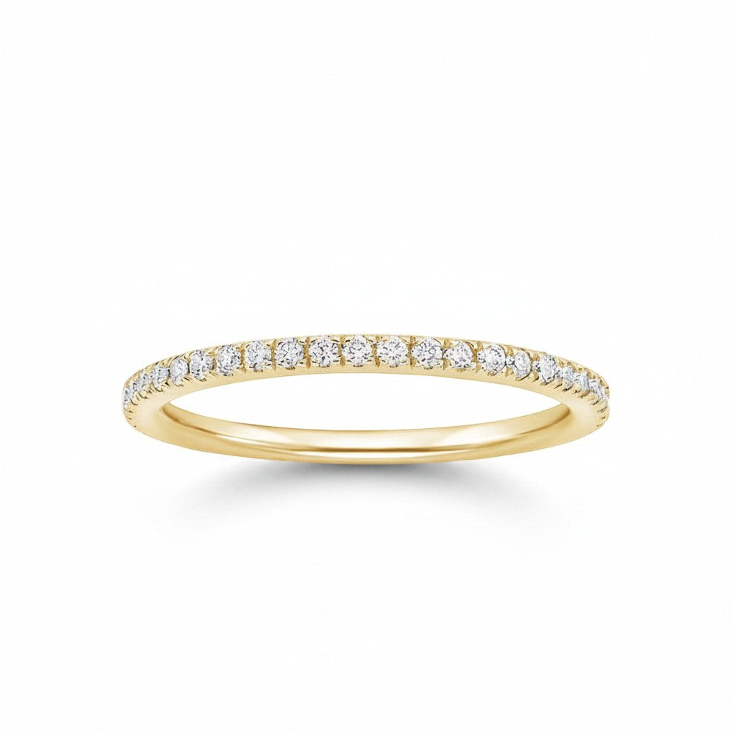 My Store 4 yellow gold wedding band featuring a delicate row of French-set micro-pavé round brilliant diamonds.