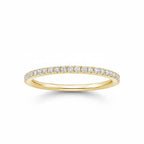 My Store 4 yellow gold wedding band featuring a delicate row of French-set micro-pavé round brilliant diamonds.