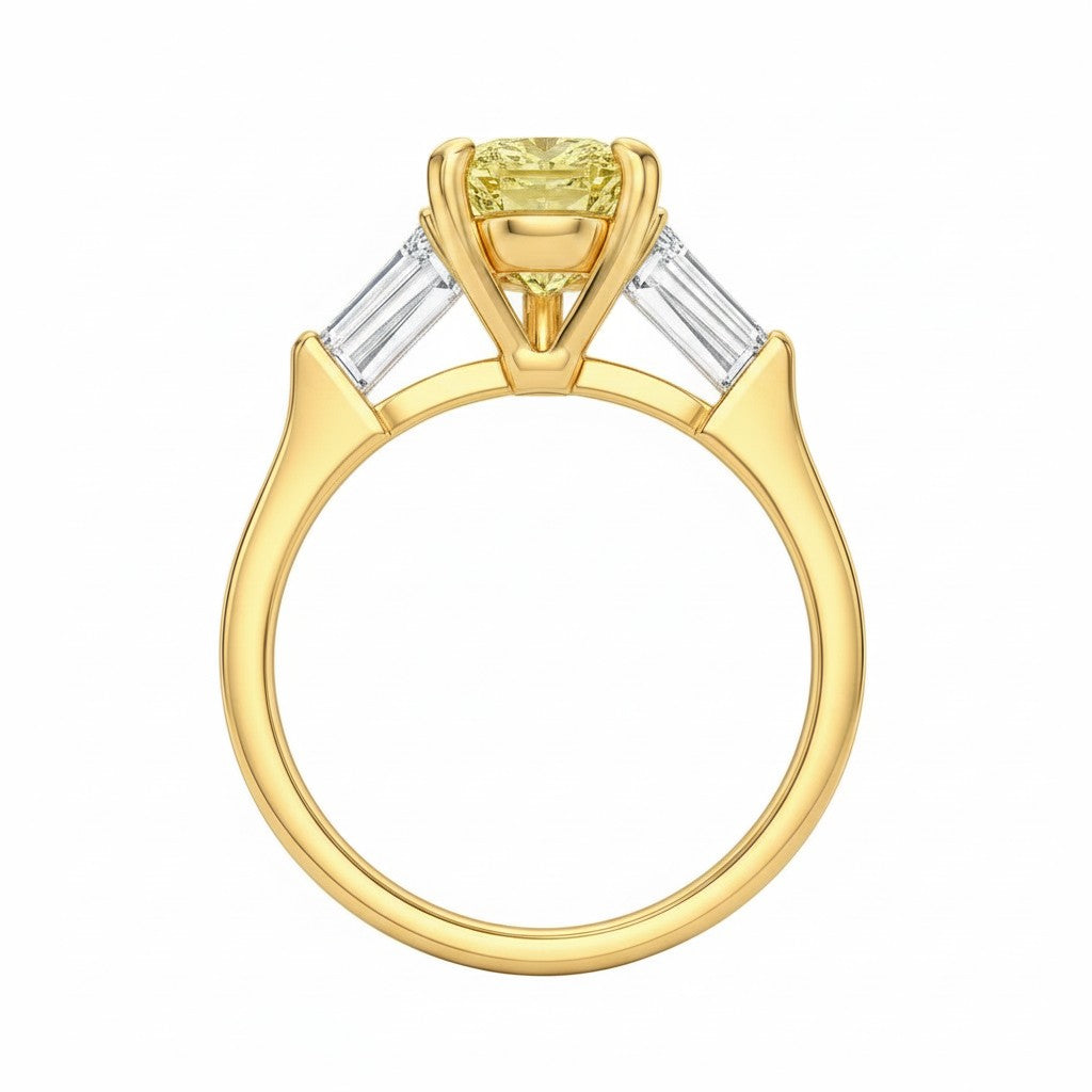 My Store 4 18K yellow gold trilogy ring featuring a pear-cut yellow diamond and baguette-cut side diamonds.