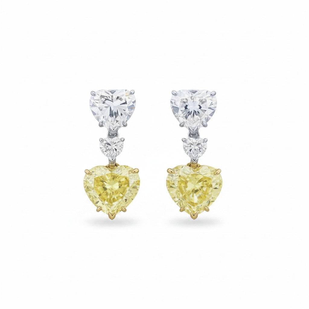 My Store 4 drop earrings featuring white diamond tops and fancy yellow heart-cut diamond drops in two-tone gold.