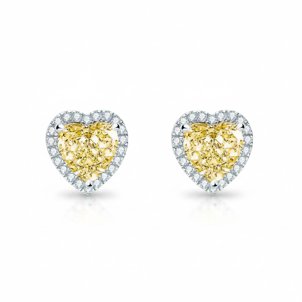My Store 4 18K solid gold stud earrings featuring 4 carat yellow heart-shaped lab-grown diamonds with a sparkling halo.
