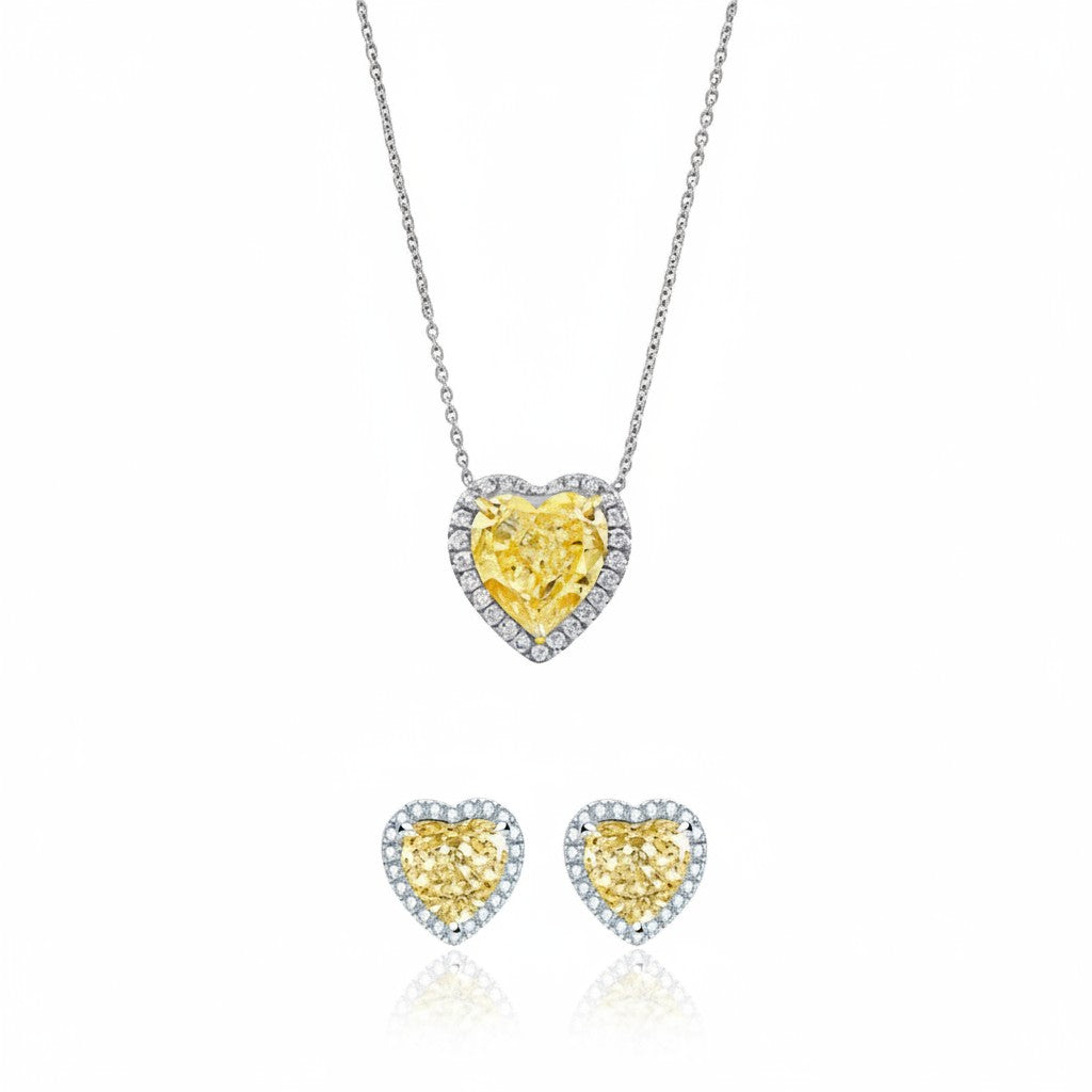 My Store 4 yellow heart diamond halo necklace and stud earrings set with white diamond accents in 18K gold.