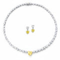 My Store 4 mixed cut white diamond tennis necklace with a central yellow heart diamond and matching drop earrings.